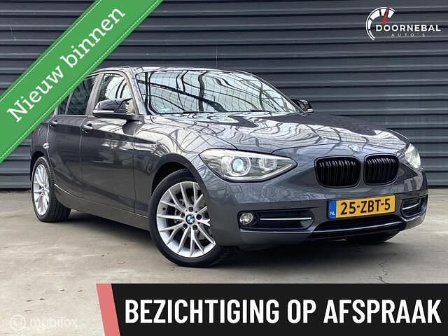 Grijs Occasion 2012 BMW 114 Comfort Edition Hatchback | € 5.940 (Eerlijke prijs) - Afbeelding 1/4
