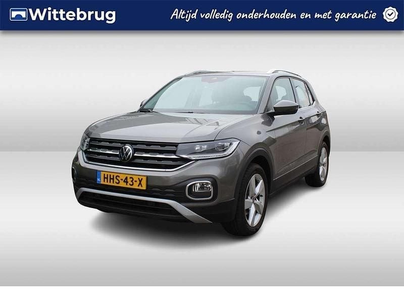 Grijs, metallic lak Gebruikt 2021 VW T-Cross Style SUV | € 20.450 (Eerlijke prijs) - Afbeelding 1/2
