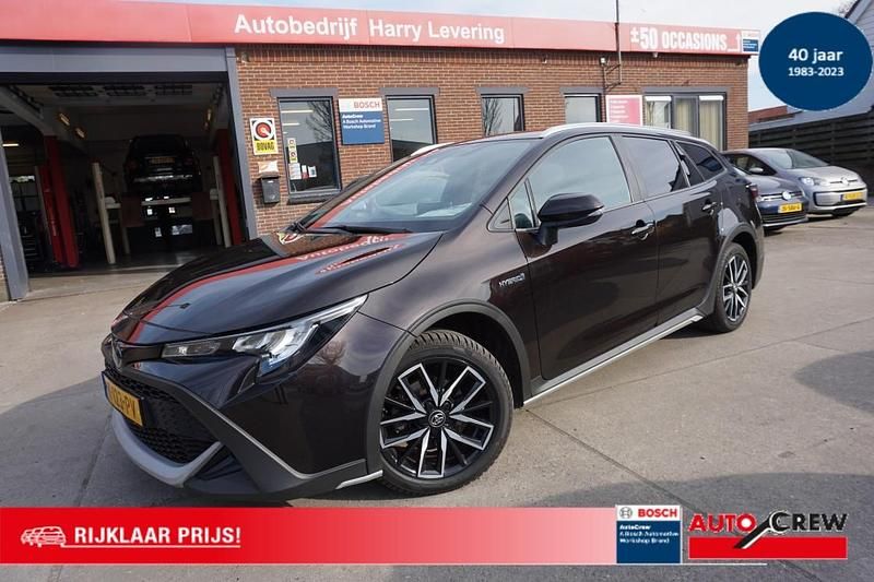 Bruin Occasion 2021 Toyota Corolla Stationwagen | € 21.950 (Eerlijke prijs) - Afbeelding 1/4