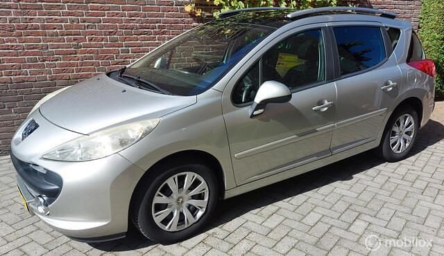 Grijs Gebruikt 2007 Peugeot 207 Stationwagen | € 998 (Goede deal) - Afbeelding 1/4