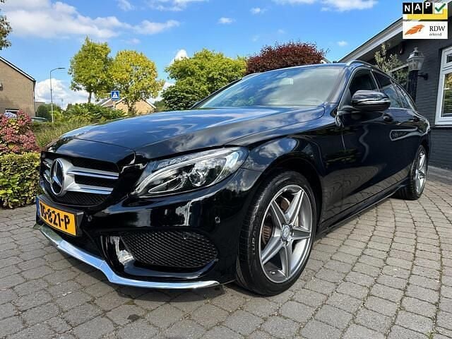 Zwart Gebruikt 2016 Mercedes C180 AMG Stationwagen | € 18.850 (Goede deal) - Afbeelding 1/4