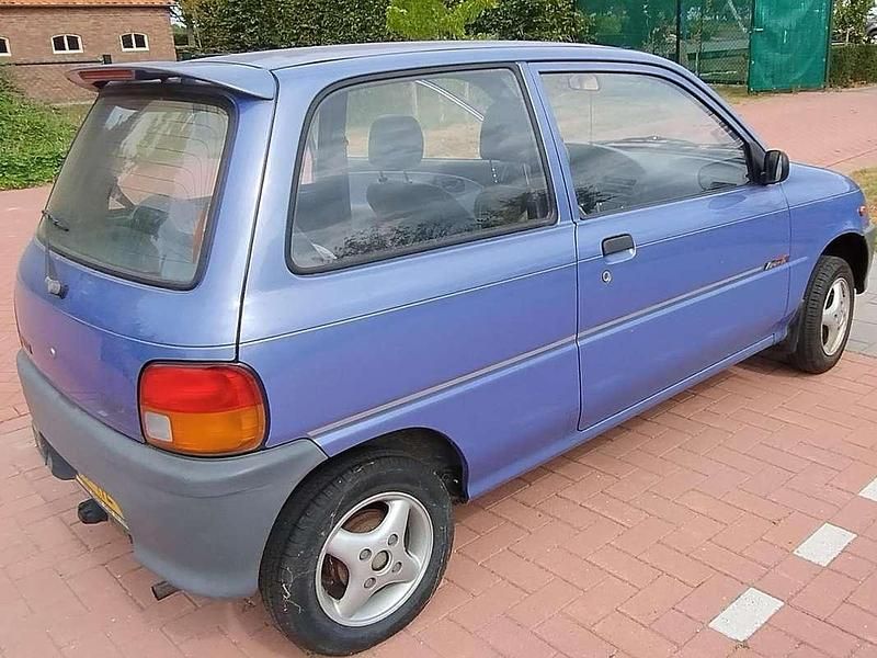 Blauw Gebruikt 1996 Daihatsu Cuore Hatchback | € 500 - Afbeelding 1/4