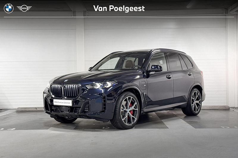 M carbonschwarz Gebruikt 2024 BMW X5 Comfort Edition SUV | € 104.900 (Iets duurder) - Afbeelding 1/2