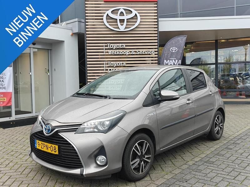 Bruin Gebruikt 2015 Toyota Yaris Hybrid Hatchback | € 11.900 (Eerlijke prijs) - Afbeelding 1/4