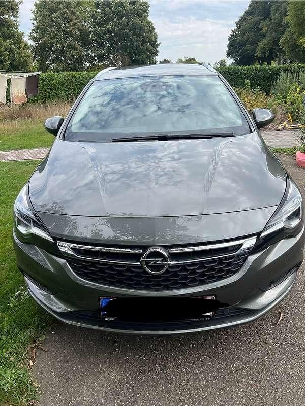 Brons Gebruikt 2018 Opel Astra Stationwagen | € 9.000 (Goede deal) - Afbeelding 1/4