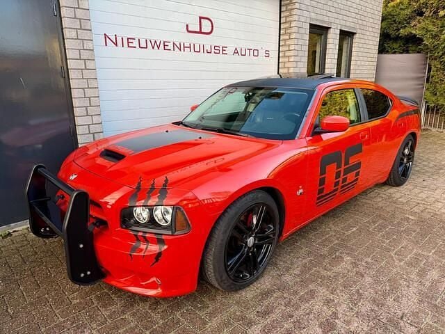 Oranje Gebruikt 2009 Dodge Charger Sedan | € 19.950 - Afbeelding 1/4