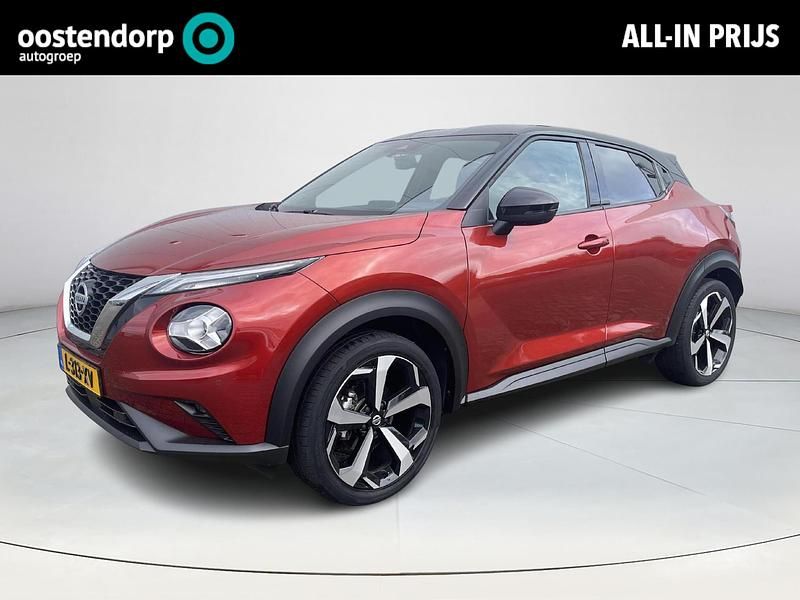 Fuji sunset red rood Gebruikt 2021 Nissan Juke Tekna SUV | € 22.850 (Iets duurder) - Afbeelding 1/4