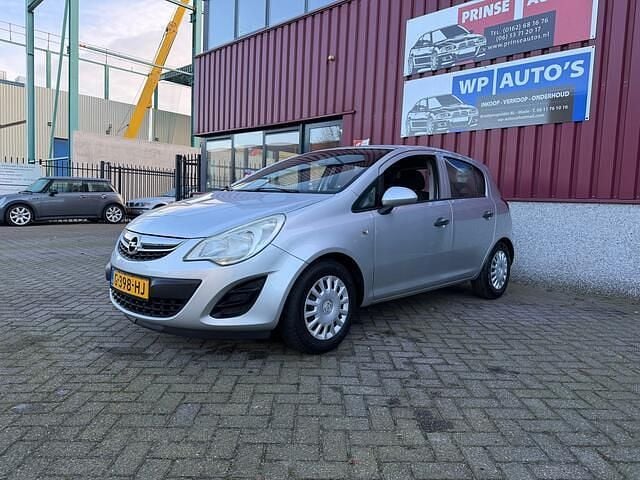 Grijs (metallic) Gebruikt 2011 Opel Corsa Hatchback | € 2.750 (Super prijs) - Afbeelding 1/4