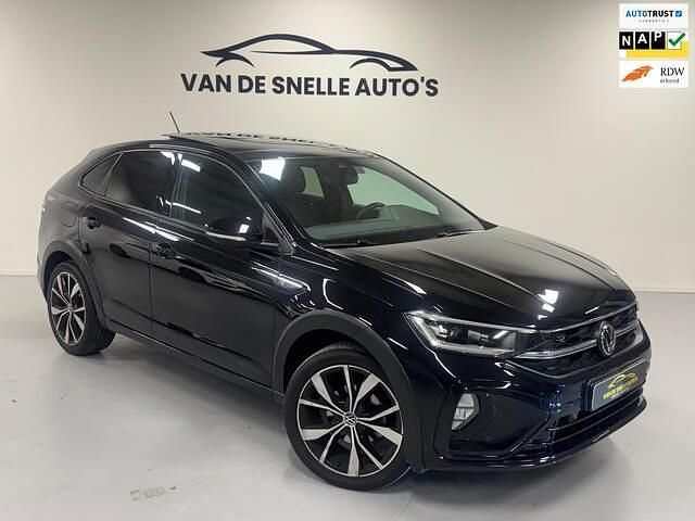 Zwart Gebruikt 2022 VW Taigo R-line SUV | € 25.990 (Eerlijke prijs) - Afbeelding 1/4