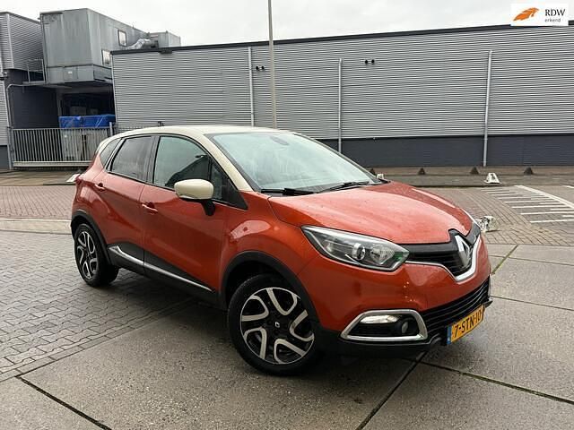 Oranje Gebruikt 2013 Renault Captur Dynamique SUV | € 7.450 (Eerlijke prijs) - Afbeelding 1/4
