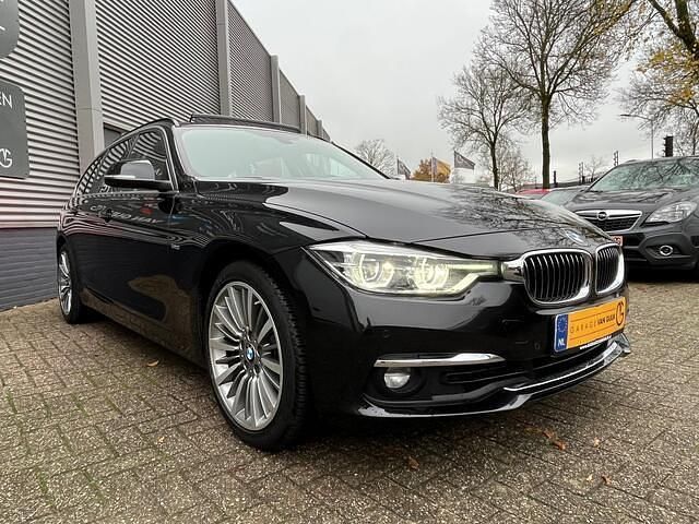 Occasion BMW 320 Luxury Line 184 PK (135 kW) 2017 Zwart (metallic) Stationwagen