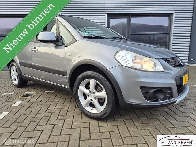 Grijs Occasion 2012 Suzuki SX4 Comfort MPV | € 9.400 (Eerlijke prijs) - Afbeelding 1/4