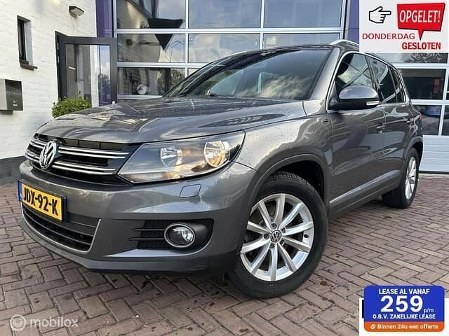 Grijs Gebruikt 2016 VW Tiguan LOUNGE SUV | € 15.999 (Eerlijke prijs) - Afbeelding 1/4