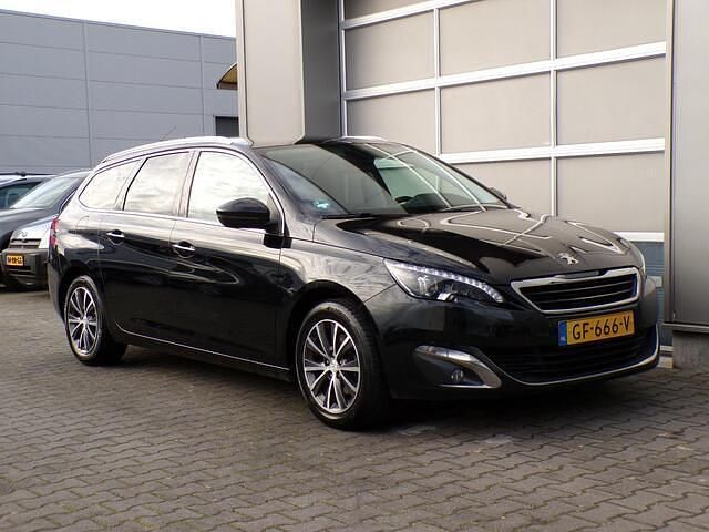 Zwart (metallic) Gebruikt 2015 Peugeot 308 SW Premium Stationwagen | € 3.950 (Super prijs) - Afbeelding 1/4