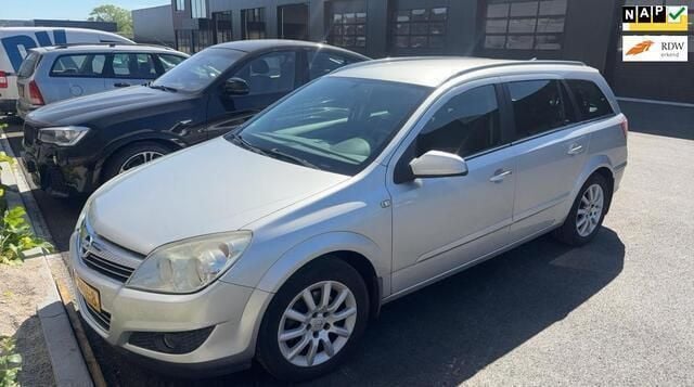 Grijs Gebruikt 2009 Opel Astra Stationwagen | € 1.249 (Eerlijke prijs) - Afbeelding 1/4