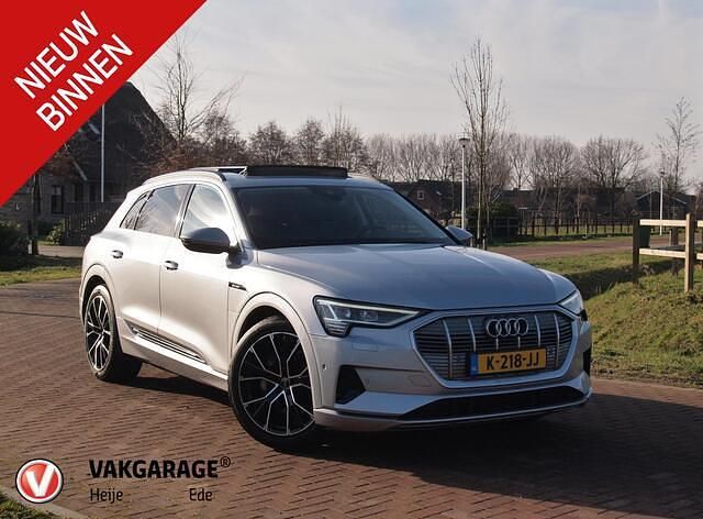 Grijs (metallic) Occasion 2020 Audi e-tron Business SUV | € 27.995 (Goede deal) - Afbeelding 1/4