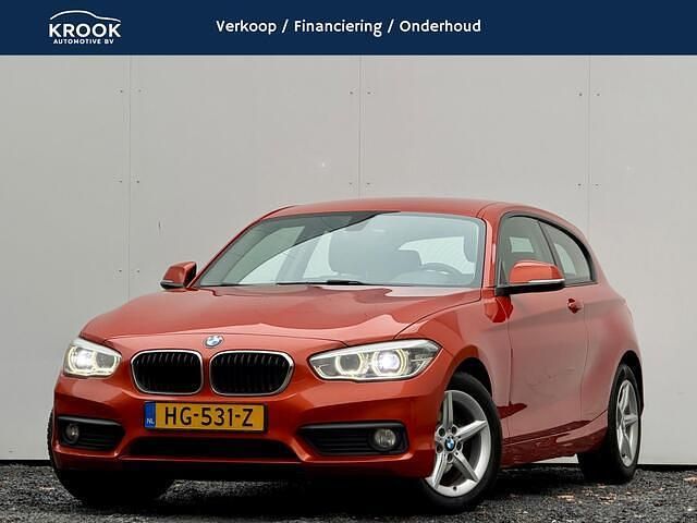 Oranje Occasion 2015 BMW 118 Hatchback | € 12.400 (Eerlijke prijs) - Afbeelding 1/3