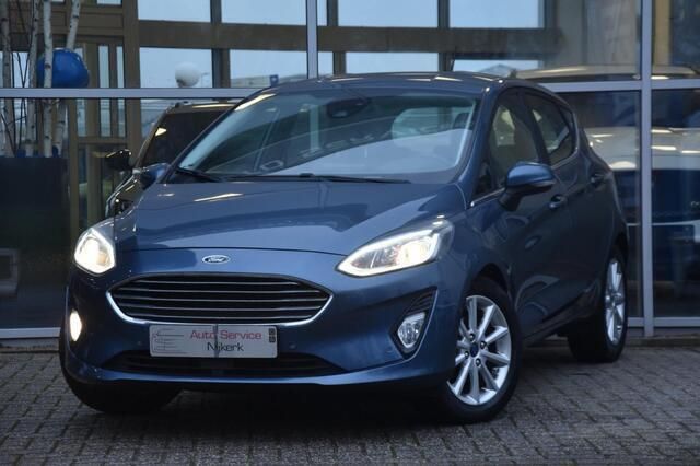 Blauw, metallic lak Gebruikt 2019 Ford Fiesta Titanium Hatchback | € 7.499 (Goede deal) - Afbeelding 1/4