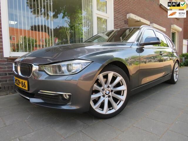 Grijs Gebruikt 2013 BMW 320 Executive Stationwagen | € 6.750 (Duur) - Afbeelding 1/4