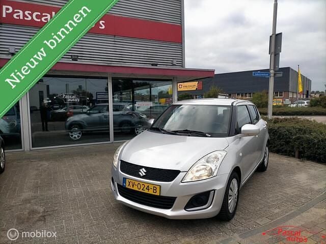 Grijs Gebruikt 2015 Suzuki Swift Style Hatchback | € 7.850 (Eerlijke prijs) - Afbeelding 1/4