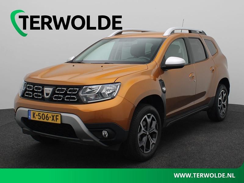 Oranje Gebruikt 2021 Dacia Duster Prestige SUV | € 15.445 (Eerlijke prijs) - Afbeelding 1/4
