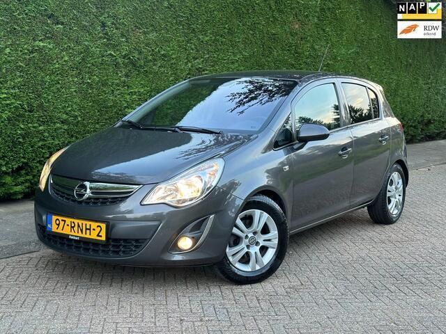 Grijs Gebruikt 2011 Opel Corsa Cosmo Hatchback | € 4.250 (Eerlijke prijs) - Afbeelding 1/4