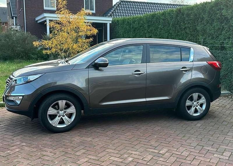 Brons Gebruikt 2012 Kia Sportage SUV | € 8.500 (Goede deal) - Afbeelding 1/4