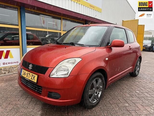 Oranje Gebruikt 2007 Suzuki Swift GLS Hatchback | € 1.750 (Goede deal) - Afbeelding 1/4
