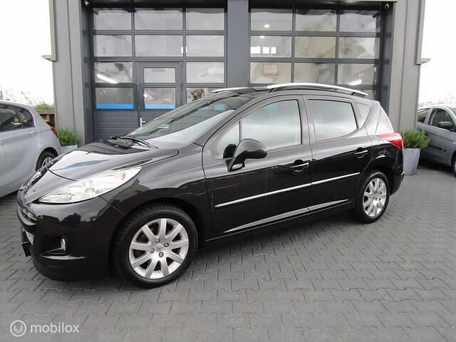 Grijs Gebruikt 2011 Peugeot 207 Sportium Stationwagen | € 2.950 (Eerlijke prijs) - Afbeelding 1/4