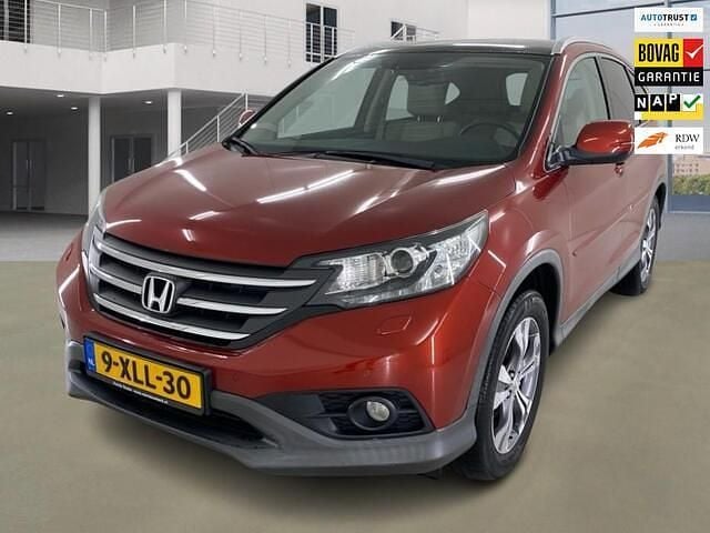 Rood (metallic) Gebruikt 2014 Honda CR-V Executive SUV | € 19.750 (Eerlijke prijs) - Afbeelding 1/4
