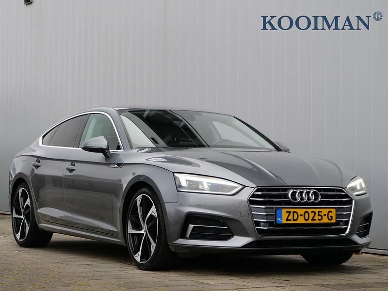 Grijs Occasion 2018 Audi A5 Design Hatchback | € 24.450 (Eerlijke prijs) - Afbeelding 1/4