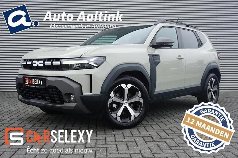 Grijs Gebruikt 2024 Dacia Duster Journey SUV | € 29.675 - Afbeelding 1/4