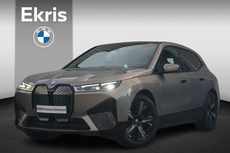 Grijs Occasion 2024 BMW iX Executive SUV | € 71.900 (Eerlijke prijs) - Afbeelding 1/4