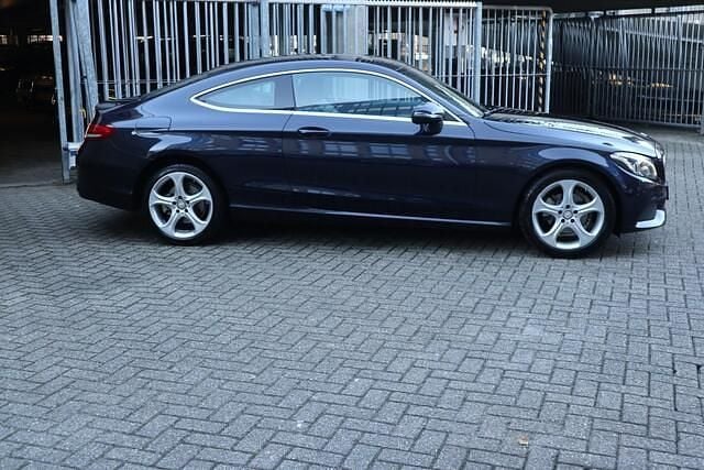 Occasion Mercedes C180 Edition 1 157 PK (115 kW) 2015 Blauw Coupé