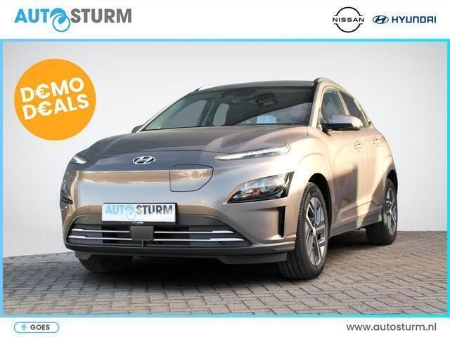 Bruin, metallic lak Gebruikt 2023 Hyundai Kona Premium SUV | € 22.890 (Eerlijke prijs) - Afbeelding 1/4