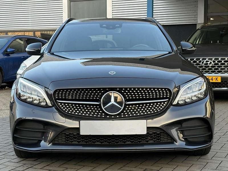 Occasion Mercedes C300e AMG line 320 PK (235 kW) 2020 Zwart Stationwagen