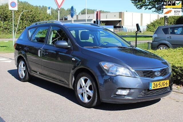 Grijs Gebruikt 2012 Kia Ceed Plus Stationwagen | € 5.950 (Eerlijke prijs) - Afbeelding 1/4
