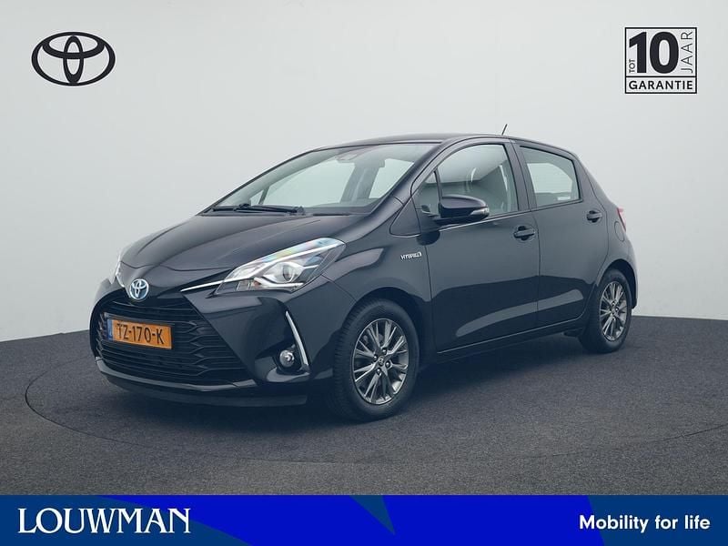 Zwart Gebruikt 2018 Toyota Yaris Hybrid Executive Hatchback | € 16.880 (Eerlijke prijs) - Afbeelding 1/4