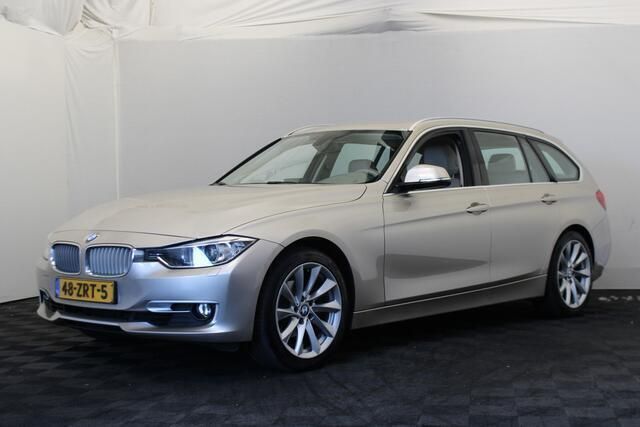 Grijs Gebruikt 2013 BMW 320 Executive Stationwagen | € 10.999 (Eerlijke prijs) - Afbeelding 1/4