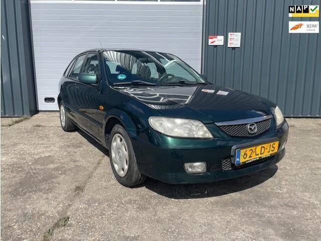 Groen Gebruikt 2002 Mazda 323 Exclusive Hatchback | € 995 (Super prijs) - Afbeelding 1/4