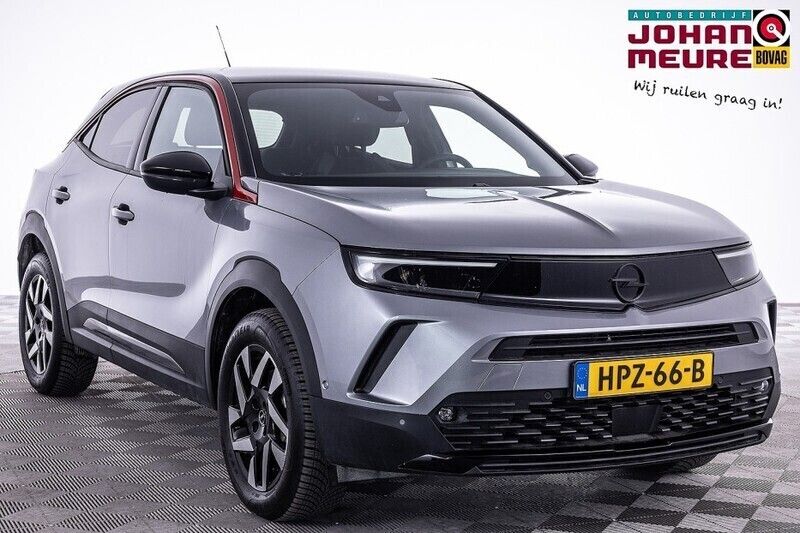 Grijs Gebruikt 2023 Opel Mokka-e SUV | € 22.990 (Eerlijke prijs) - Afbeelding 1/4
