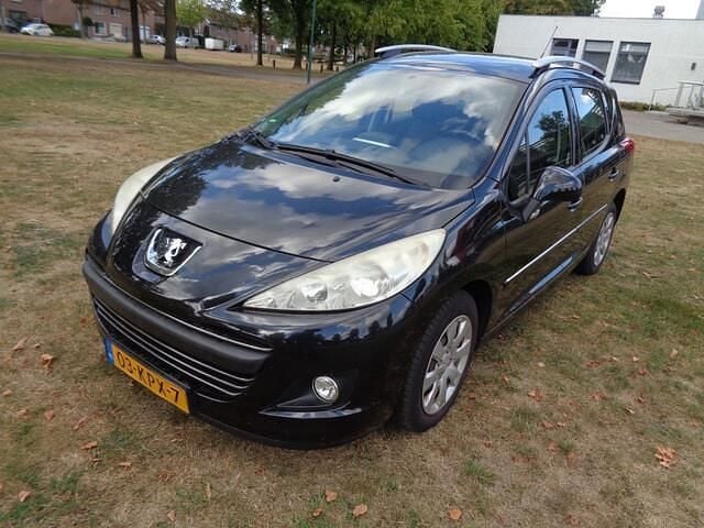 Zwart Gebruikt 2010 Peugeot 207 Hatchback | € 1.498 (Super prijs) - Afbeelding 1/4