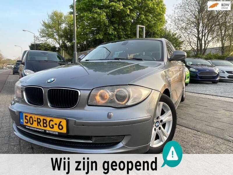Grijs, metallic lak Gebruikt 2011 BMW 116 Hatchback | € 5.495 (Eerlijke prijs) - Afbeelding 1/4