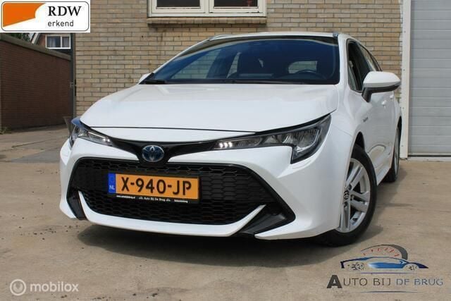 Wit Gebruikt 2020 Toyota Corolla Business Edition Stationwagen | € 18.790 (Goede deal) - Afbeelding 1/4