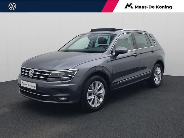 Grijs (metallic) Occasion 2018 VW Tiguan Highline SUV | € 27.440 (Goede deal) - Afbeelding 1/4