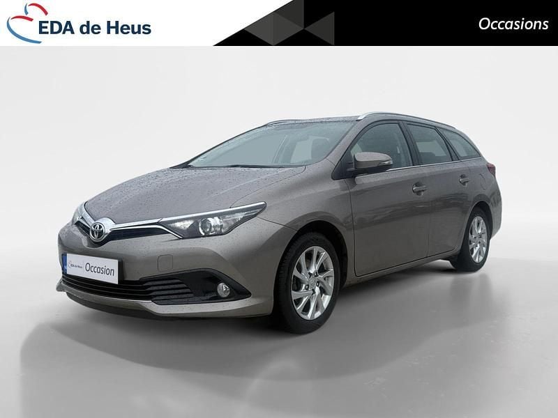 Bruin Occasion 2015 Toyota Auris Stationwagen | € 9.435 (Eerlijke prijs) - Afbeelding 1/4