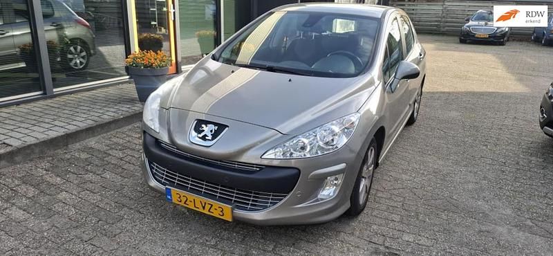 Grijs Gebruikt 2010 Peugeot 308 Hatchback | € 3.735 (Eerlijke prijs) - Afbeelding 1/4