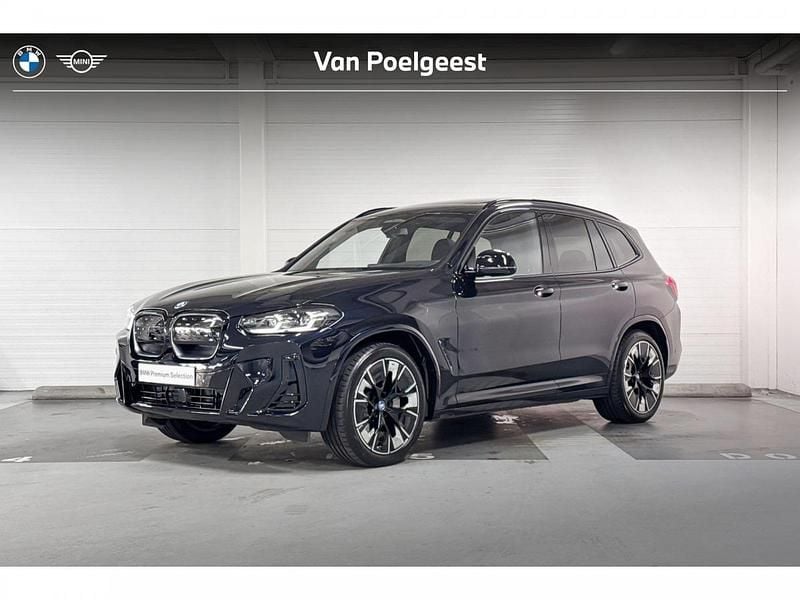M carbonschwarz metallic (416) (zwart metallic) Gebruikt 2024 BMW iX3 Comfort Edition SUV | € 56.900 (Eerlijke prijs) - Afbeelding 1/3