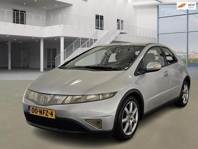 Grijs Gebruikt 2006 Honda Civic Comfort Hatchback | € 2.650 (Eerlijke prijs) - Afbeelding 1/4