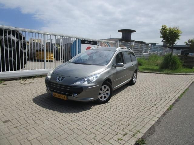 Grijs Gebruikt 2007 Peugeot 307 Premium Stationwagen | € 1.950 (Eerlijke prijs) - Afbeelding 1/4